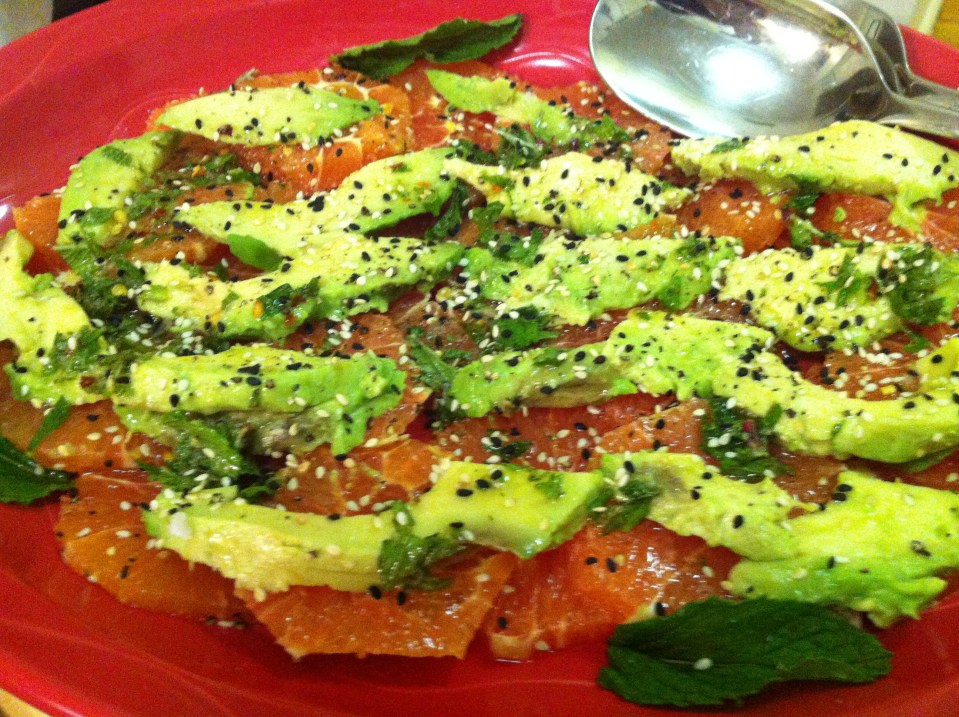 Blood orange and avocado salad with mint, sesame seeds, and lime